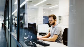 Engineer working on a project on a computer.