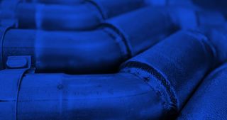 Upward view of industrial ventilation ducts.